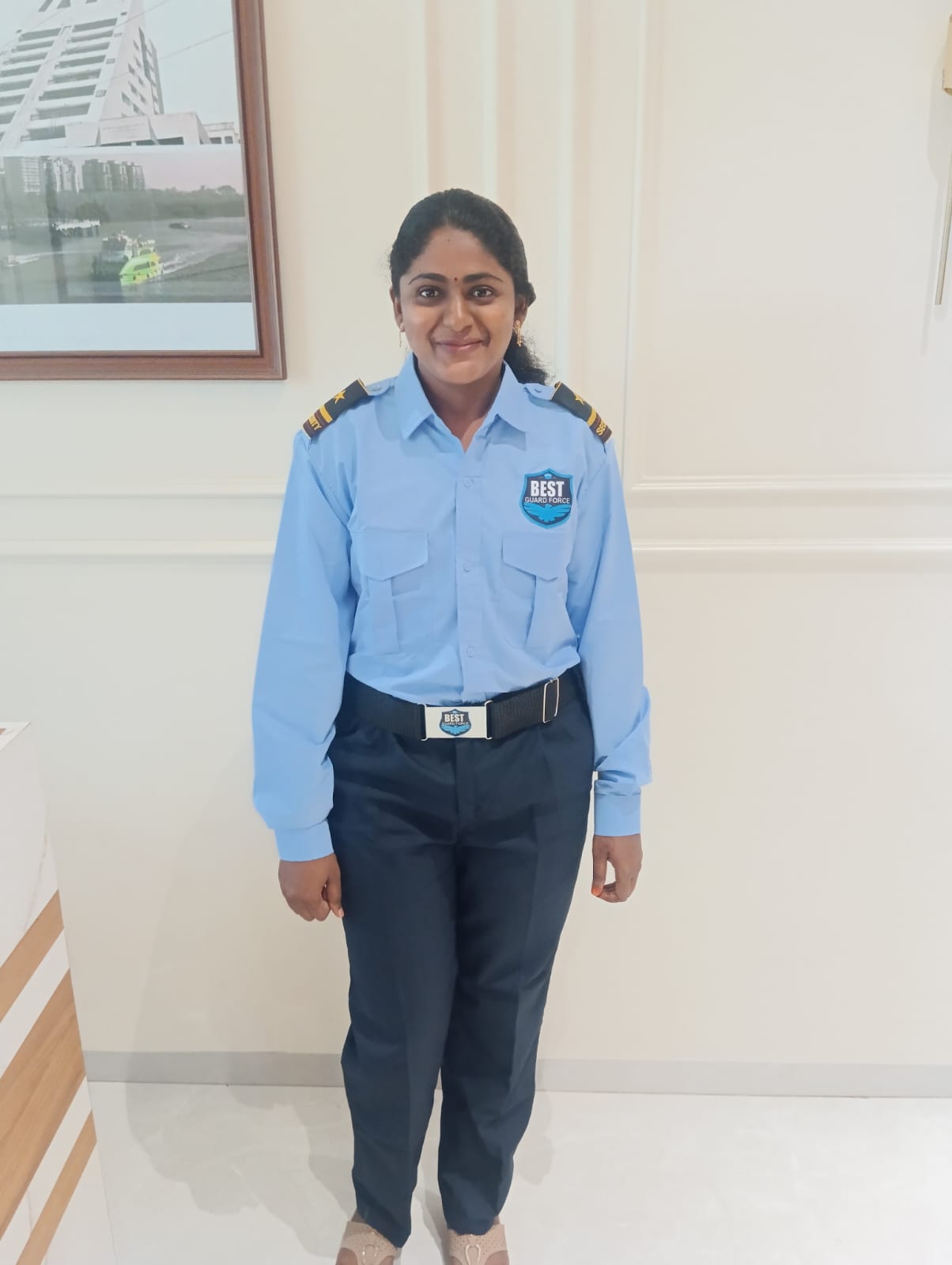 Female security officer in Best Guard Force uniform